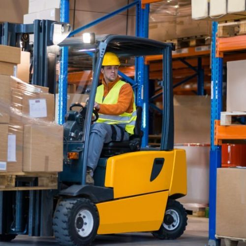 Warehouse Worker With Forklift